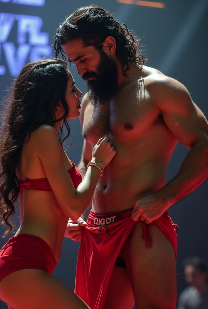 A young Puerto Rican man with a beard, hairy, strong and muscular, in red underwear, having his underwear pulled down, torn and ripped by a beautiful woman in red panties crouching in front of him, in performance on a stage of a television program presented by a famous presenter.