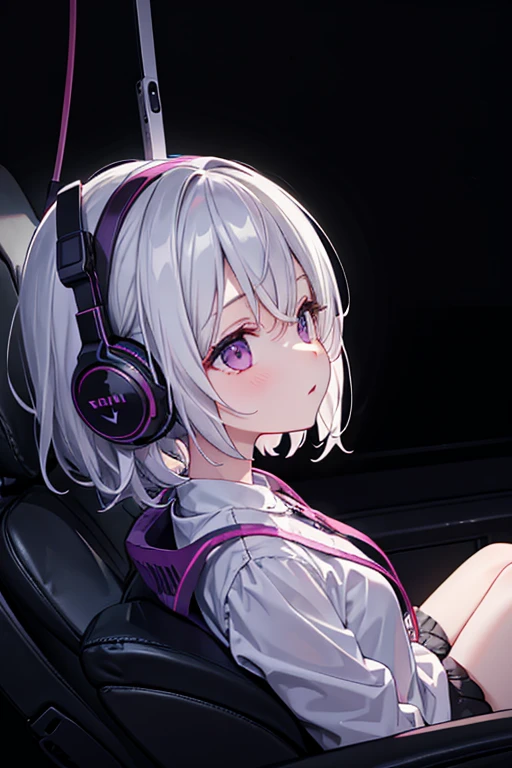 A girl wearing headphones is listening to music in a dark room、From an angle