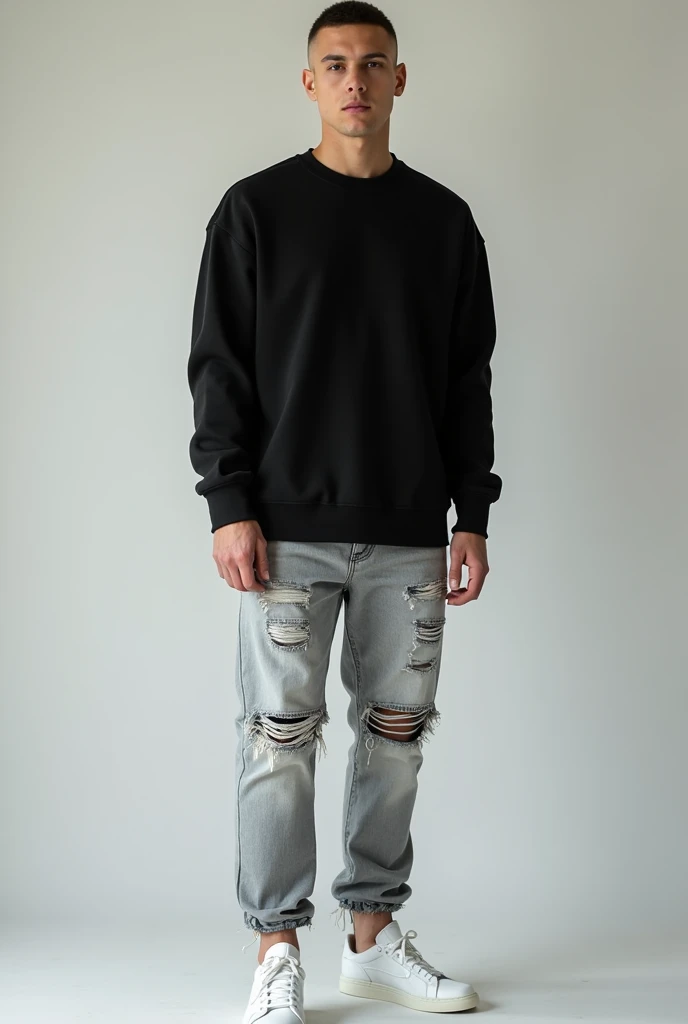 A man wear black sweatshirt and light grey normal damage Jens and white shoes and buzz hear cut