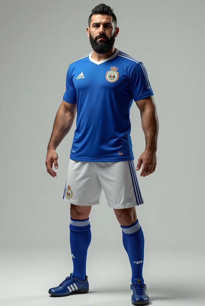 A strong, bearded Iranian man wearing the El Salvador national football team uniform. He must wear a blue shirt with white details and the Salvadoran Football Federation shield on the chest.. The shorts must be white with blue details., and the socks, blue with a white stripe. His expression should be confident, e a pose, Stately, reflecting their strength and pride by wearing the uniform.