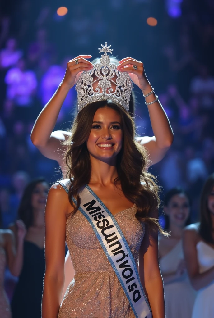 Crowning moment. From behind, The girl put the crown on the new miss Universe. Wear evening gown and sash.