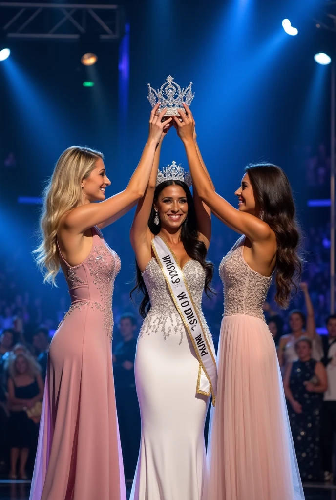 Two last standing of Miss Universe, hold hand each other. The center is Miss Universe while hold the crown up