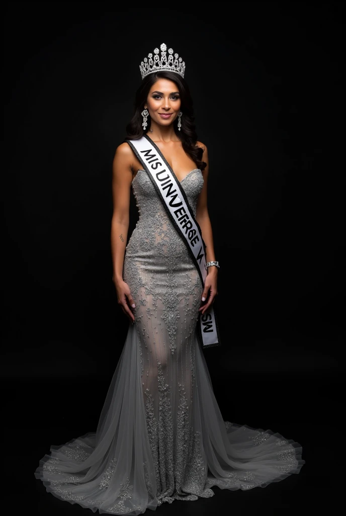 Photoshoot of miss Universe with Silver Evening gown, crown and Sash. Black Background