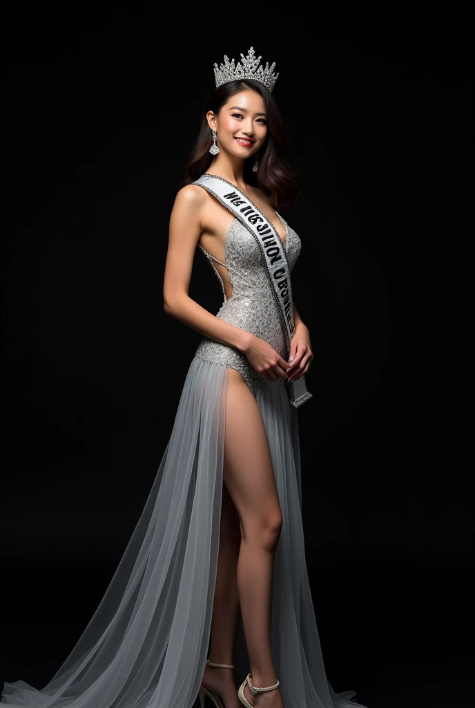 Photoshoot of miss Universe with Silver Evening gown, crown and Sash. Black Background. Slim body, beautiful asian face. 