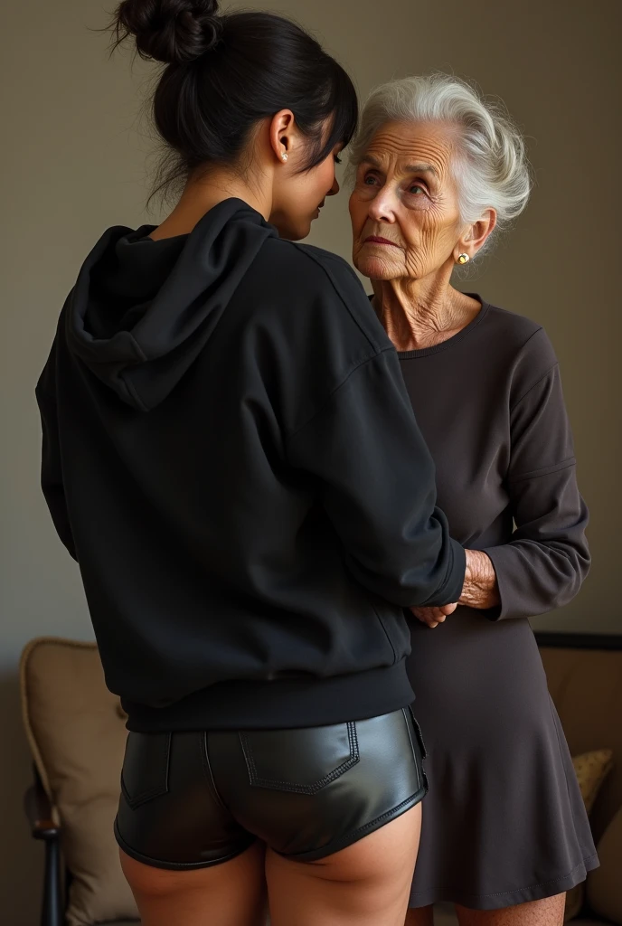 black woman hair in a bun black hoodie black leather short shorts being fucked in the ass by a old grandma in a dress
