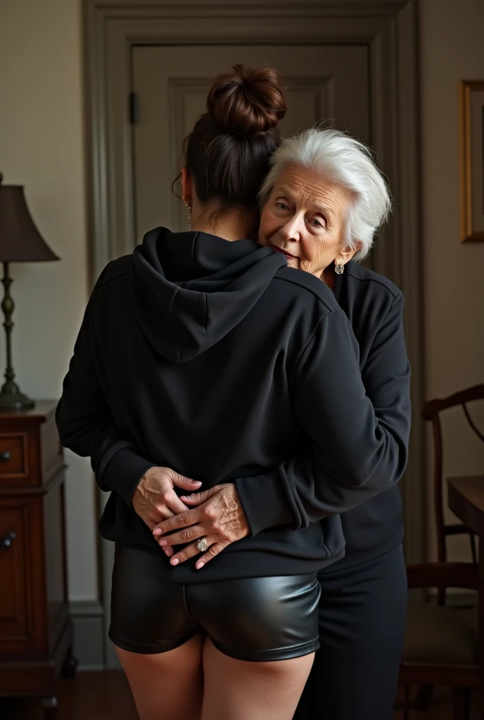 black woman hair in a bun black hoodie black leather short shorts being fucked in the ass by a old grandma in a dress
