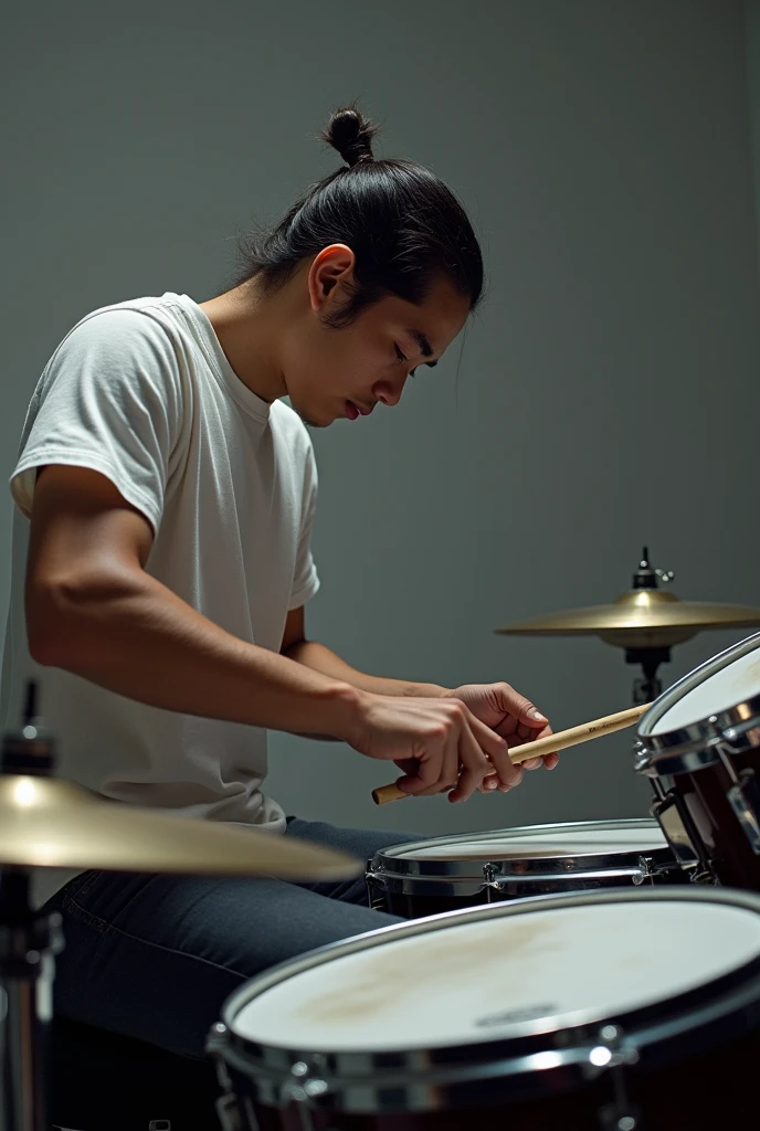 A picture of a drummer practicing with a practice pad to get strong