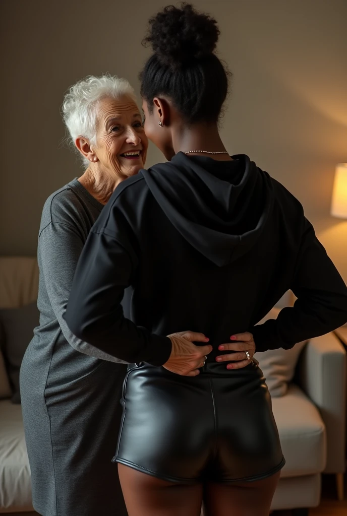 black woman hair in a bun black hoodie black leather short shorts being fucked in the ass by a old grandma in a dress