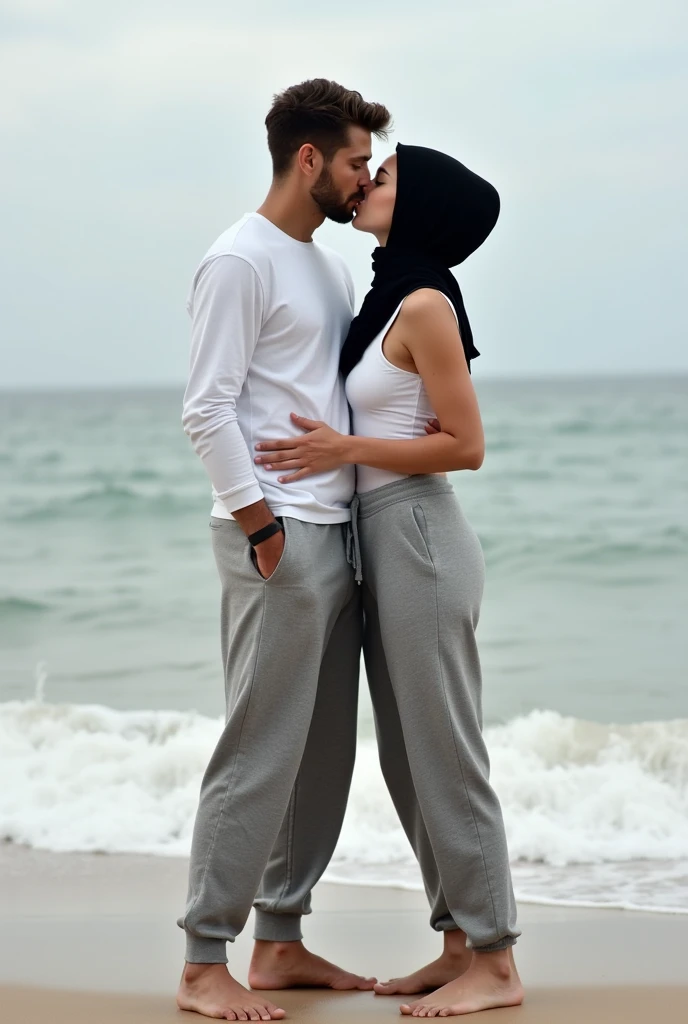 with black headscarf, white long sleeve t shirt, barefoot, grey sweatpants, skinny sexy woman kissing with her boyfriends on the beach. 