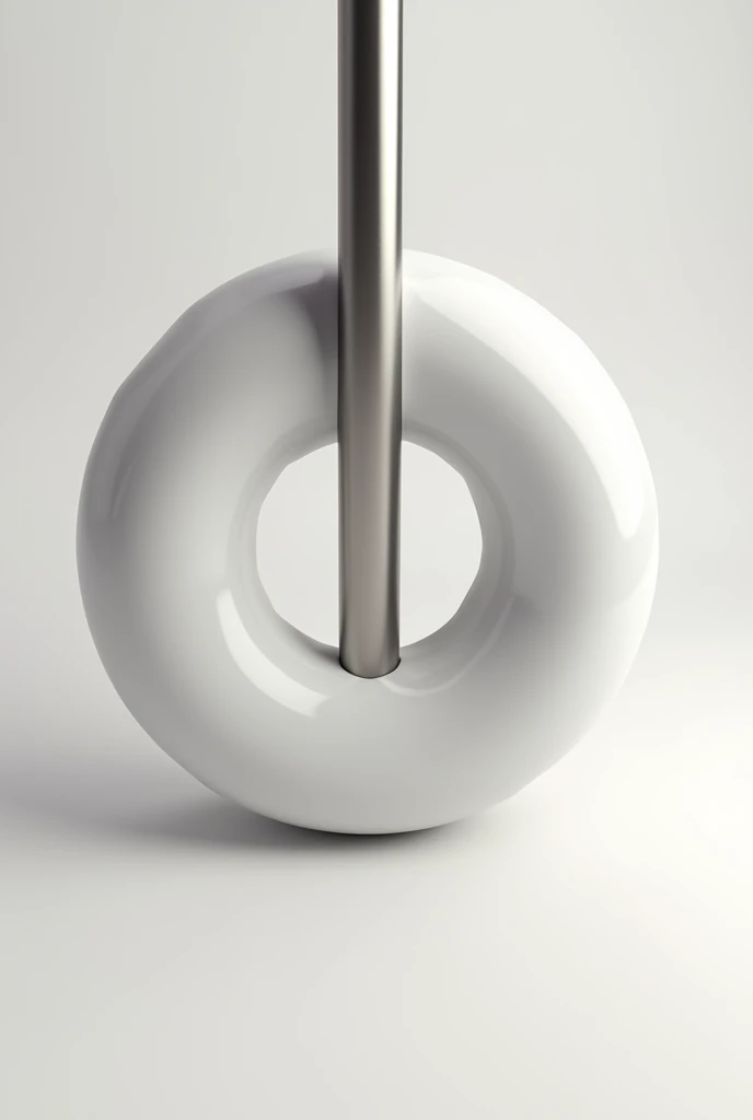 A metal rod passing through a donut through the hole