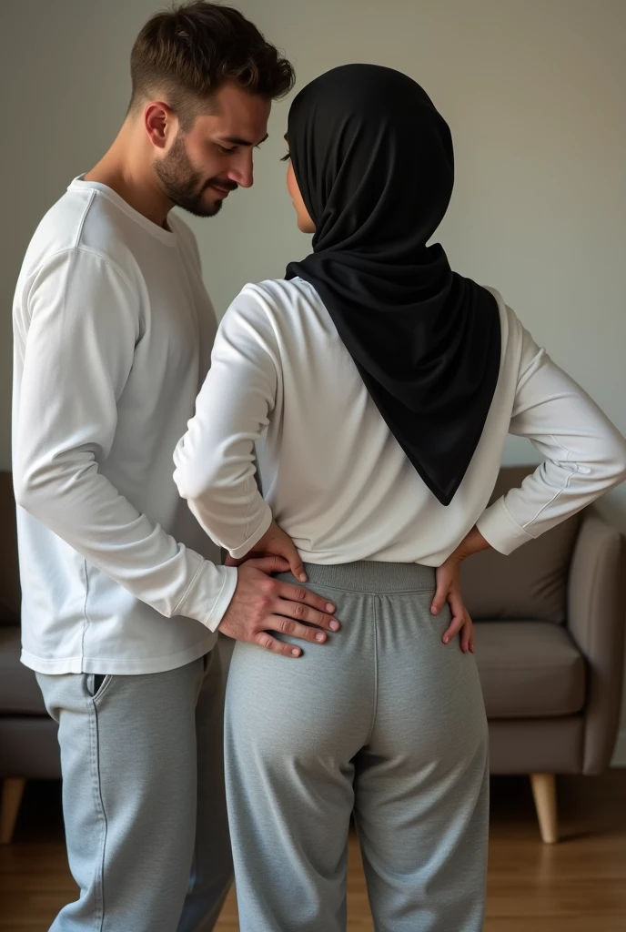 Black headscarf at home, white long sleeve t shirt, grey sweatpants, white socks, sexy woman without shoes. Men touching women&#39;s buttocks