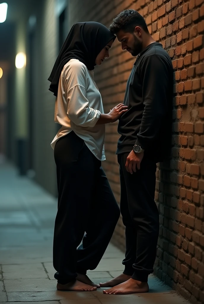 with black headscarf, black baggy sweatpants, white long sleeve t shirt, barefoot, Sexy skinny woman. Man kissing woman with her back against the wall on the street. A man touches a woman's buttocks from behind.