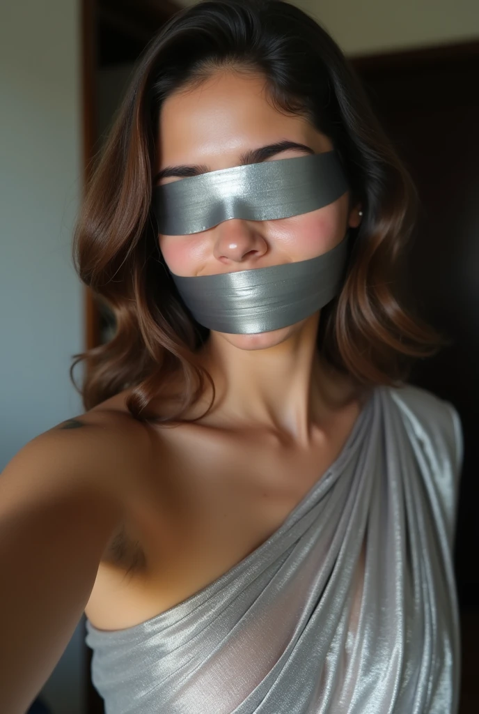 Aesthetic  Girl blindfolded Duct tape gagged in sexy silver shimmering saree Taking selfie duct tape gagged 