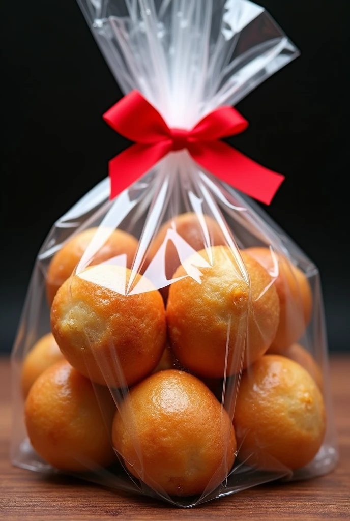 A bag of Brazilian sweet goiabinha (which is a piece of guava paste rolled in dough baked in the oven) in a plastic bag tied at the end with a red bow. There are 8 units inside the bag. Make it in a similar but different format