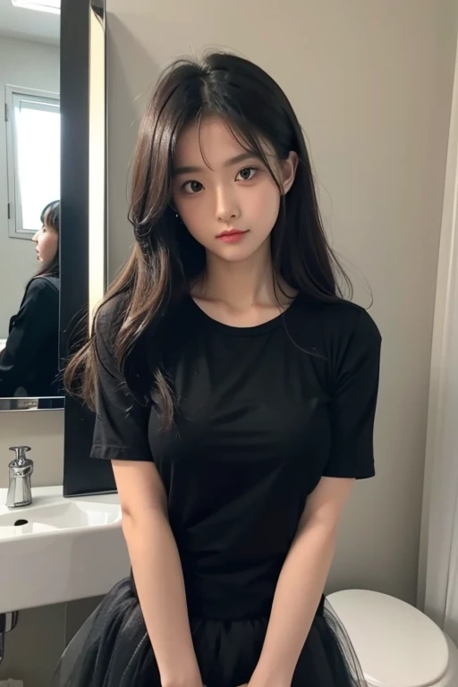 A girl really embarrassed looking at a mirror wearing a tutu and black shirt. She has large breasts