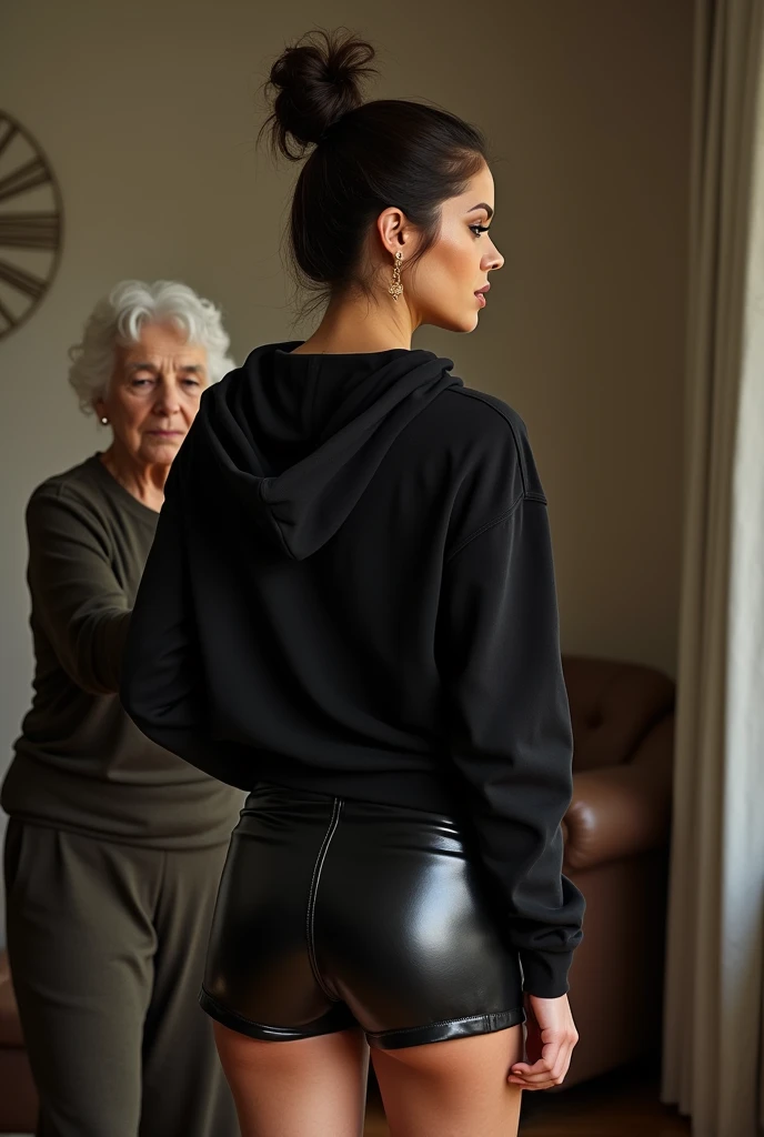 black woman hair in a bun black hoodie black leather short shorts being fucked in the ass by a old grandma in a dress