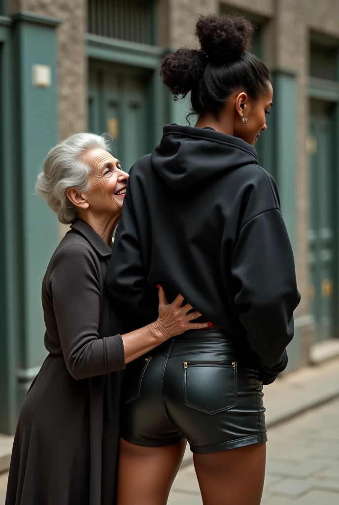 black woman hair in a bun black hoodie black leather short shorts being fucked in the ass by a old grandma in a dress