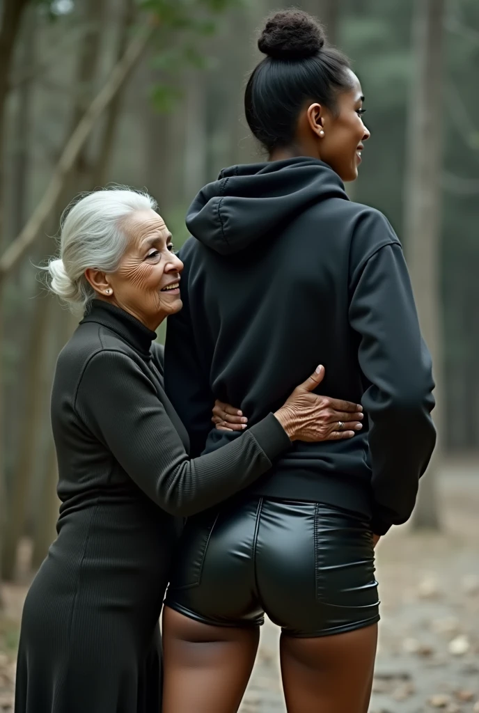 black woman hair in a bun black hoodie black leather short shorts being fucked in the ass by a old grandma in a dress