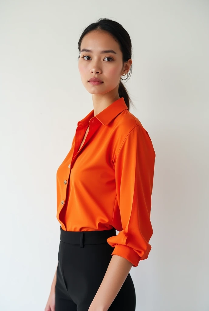 A female stand straight with white background she is in pent shirt with nice color