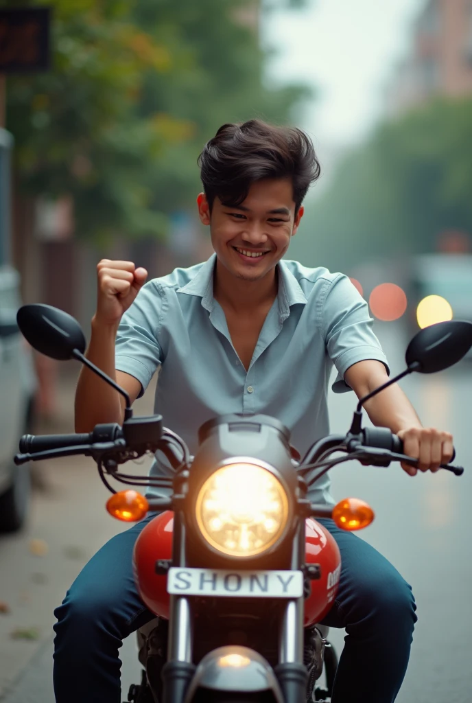 Panoramic horizontal shot of a young Thai man sitting on a motorcycle in the daytime, smiling and looking at his phone, with his right hand raised high and clenched into a fist. The headlights are very bright.