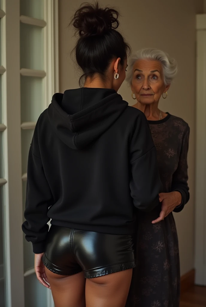 black woman hair in a bun black hoodie black leather short shorts being fucked in the ass by a old grandma in a dress
