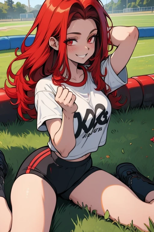Perfect face. Perfect hands. A red haired woman with red eyes and an hourglass figure in a t-shirt and gym shorts is smiling while stretching on the grass by the track