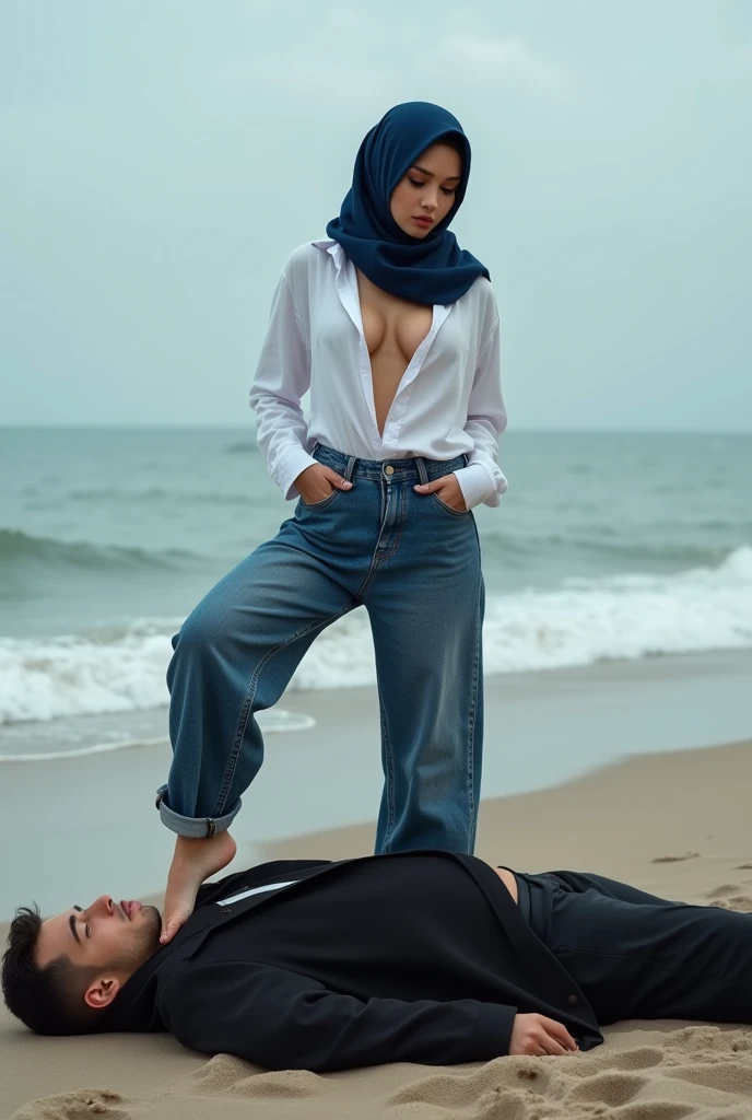 Navy blue headscarf on the beach, Black long coat, barelegged, white shirt, baggy jeans, Sexy skinny woman. Man lying in front of woman. Woman puts her foot on the front of man&#39;s sweatpants. 