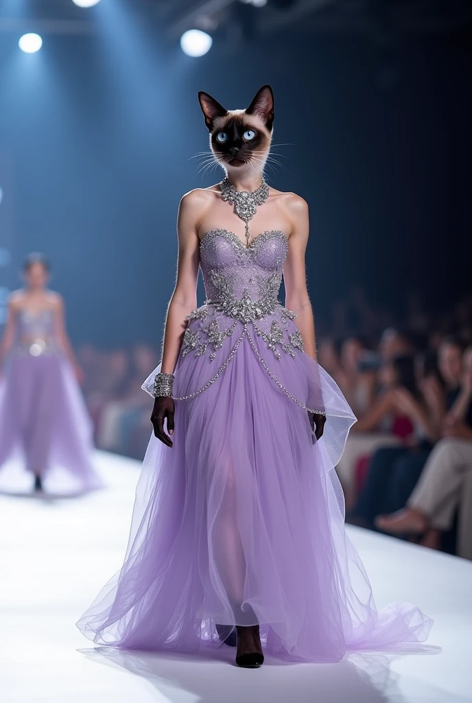 "A sleek Siamese cat showcases a lavender lehenga with silver details, walking gracefully on two legs on a well-lit runway. The cat's matching silver jewelry glistens under the lights, while the audience admires her beauty and takes photos."