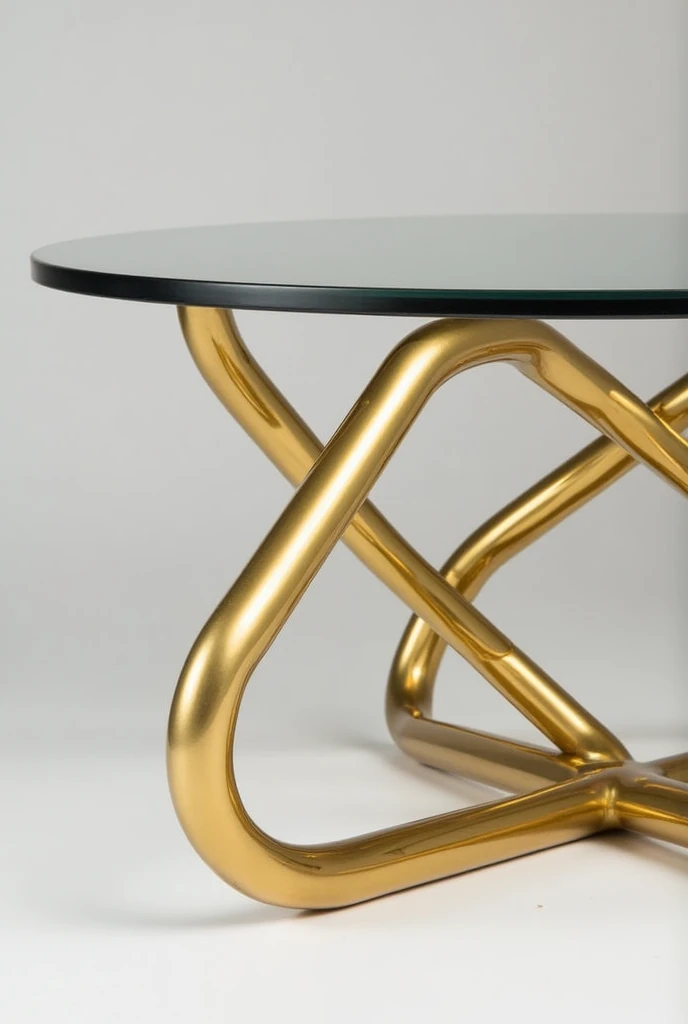 A table with a unique metal base, consisting of a set of shiny golden tubes, arranged in an elegant manner to form a three-dimensional structure.. The design exudes luxury and simplicity at the same time, as the pipes feature a rounded appearance and polished surfaces that beautifully reflect light.. The table base forms sharp angles and gradients that add visual appeal and a distinctive geometric balance to the design..
This model of legs is suitable for luxury tables and adds a modern and contemporary touch to any interior decor.. It can be used as a base for a glass or marble table to highlight its beauty and elegance of design.