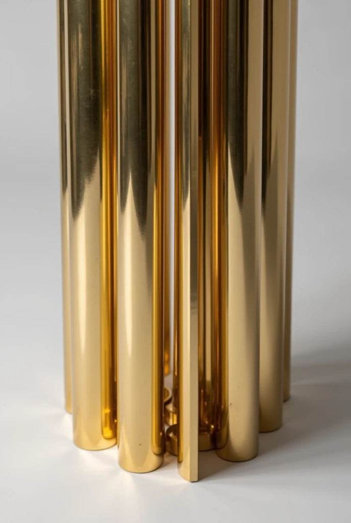 The table leg base is inspired by 1970s Art Deco, made of carefully polished brass tubes, giving it a shiny gold look.. The prominent gold columns reflect the luxurious style of the mid-century, where the geometric shapes with their clean lines intertwine with the texture of the original brass and gold plated.. This base represents the perfect blend of modernity and a classic touch from the 90s, making it an artistic decor piece that suits luxurious and elegant spaces.