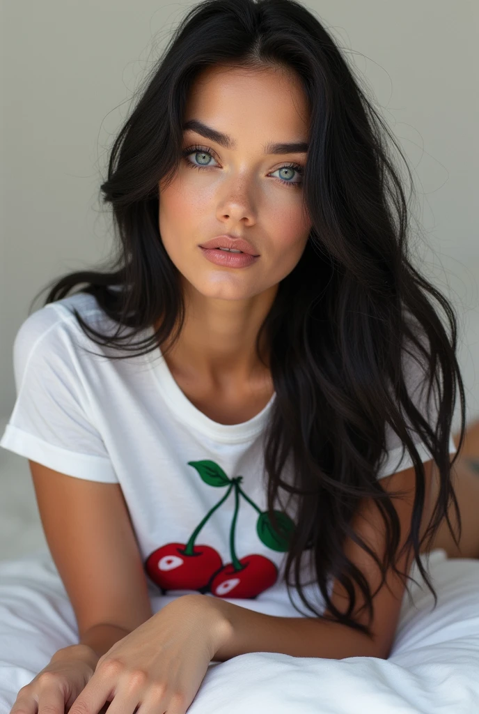 Megan Fox at 20 years old, very long black hair rapunzel straight wavy, curvy body, hourglass body, blue colored eyes, long and delicate natural nails, mouth with shiny texture,gloss labial transparente,with a cat eyeliner, golden glow. wearing white t-shirt with vintage cherry graphic, Taking a selfie Lying on a white bed, In the background it shows a white modern wall
