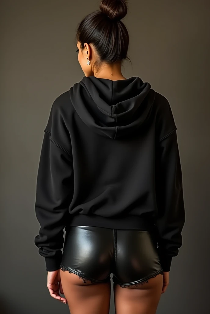 black woman hair in a bun black hoodie black leather short shorts being fucked in the ass by a old grandma in a dress