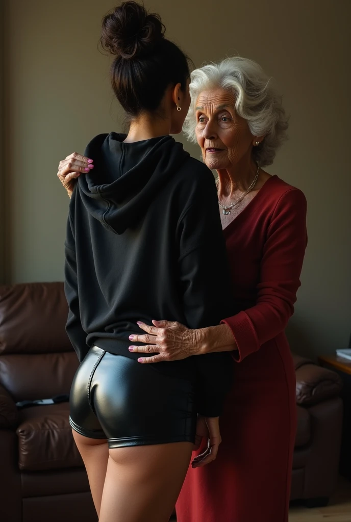 black woman hair in a bun black hoodie black leather short shorts being fucked in the ass by a old grandma in a dress