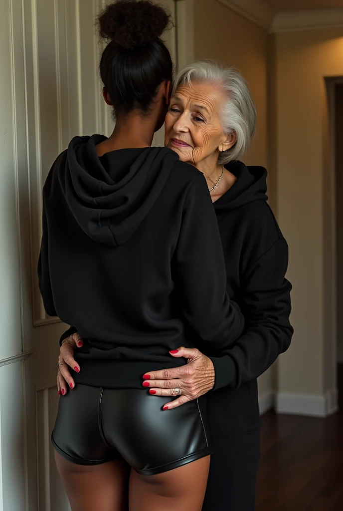 black woman hair in a bun black hoodie black leather short shorts being fucked in the ass by a old grandma in a dress