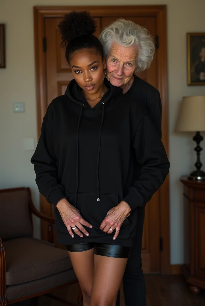 black woman hair in a bun black hoodie black leather short shorts being fucked in the ass by a old grandma in a dress