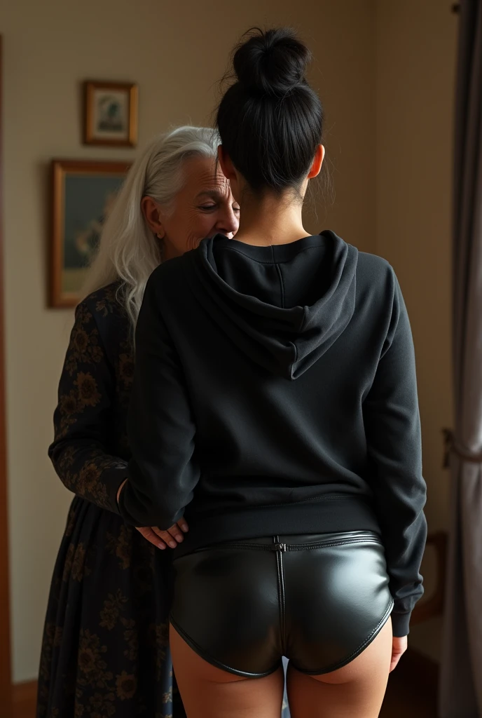 black woman hair in a bun black hoodie black leather short shorts being fucked in the ass by a old grandma in a dress