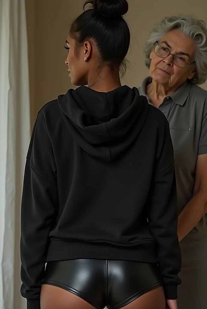 black woman hair in a bun black hoodie black leather short shorts being fucked in the ass by a old grandma in a dress