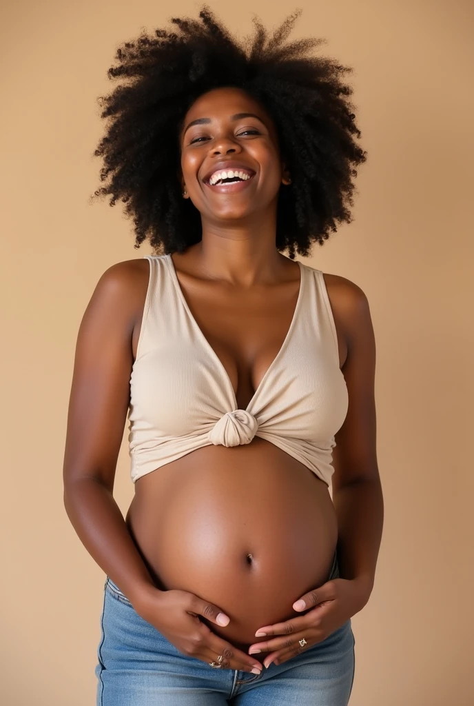 Pregnant black woman laughing
