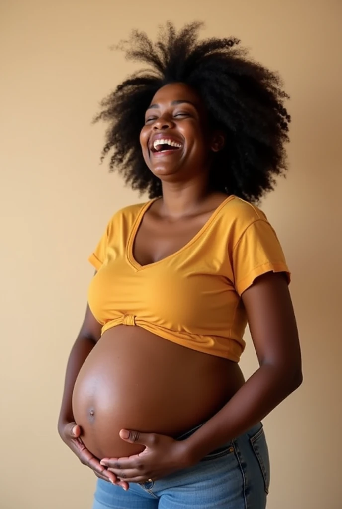 Pregnant black woman laughing