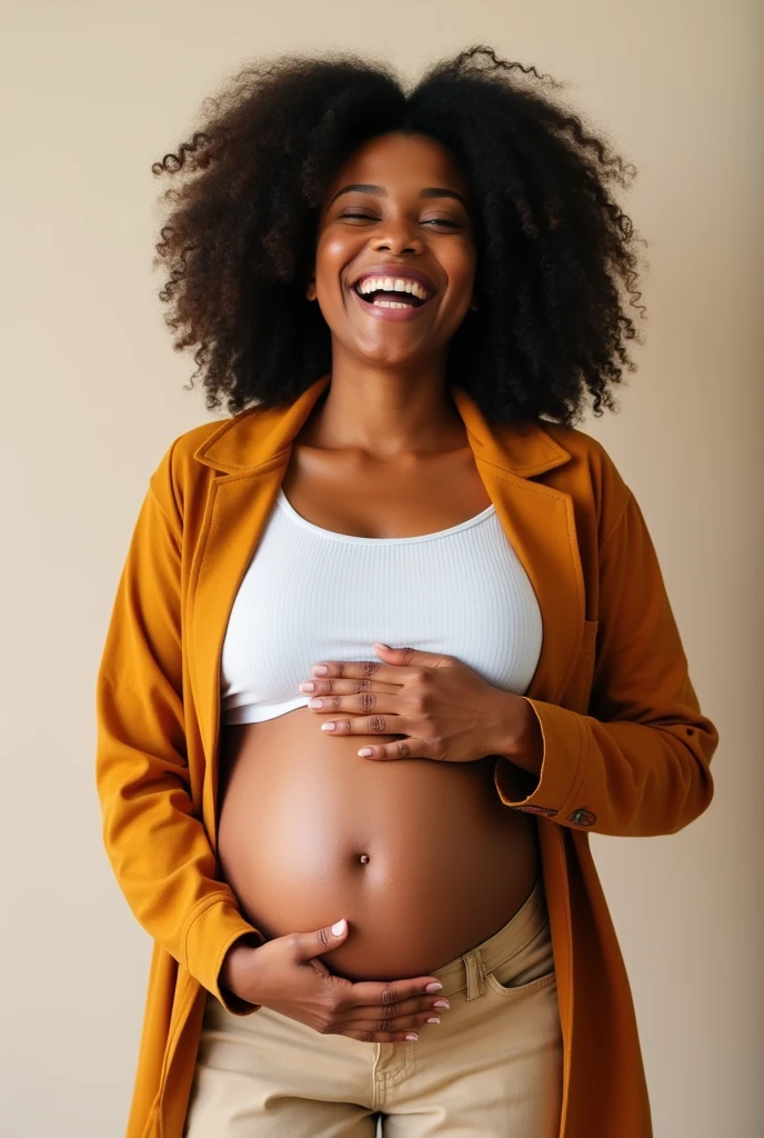 Pregnant black woman laughing