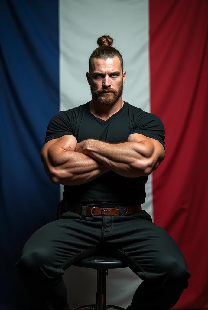 Generate a Photo of a 40 year old French male bodybuilder with mesomorph body type, Light brown bun hair, masculine face, I hook my nose, clear blue eyes, muscular arms and forearms and shoulders, crossed arms, black work shirt, cinto de couro, black pants, with a French flag in the background, seated in a chair, spotlight illuminating the face.