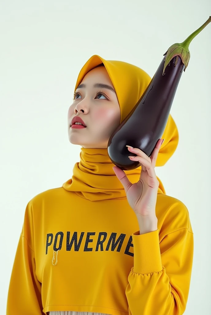 Beautiful Korean woman wearing a hijab, wearing a yellow crop top with the words "POWERMEN", right hand holding a long eggplant, at the end of the eggplant there are drops of condensed milk, left hand looking up, white begron