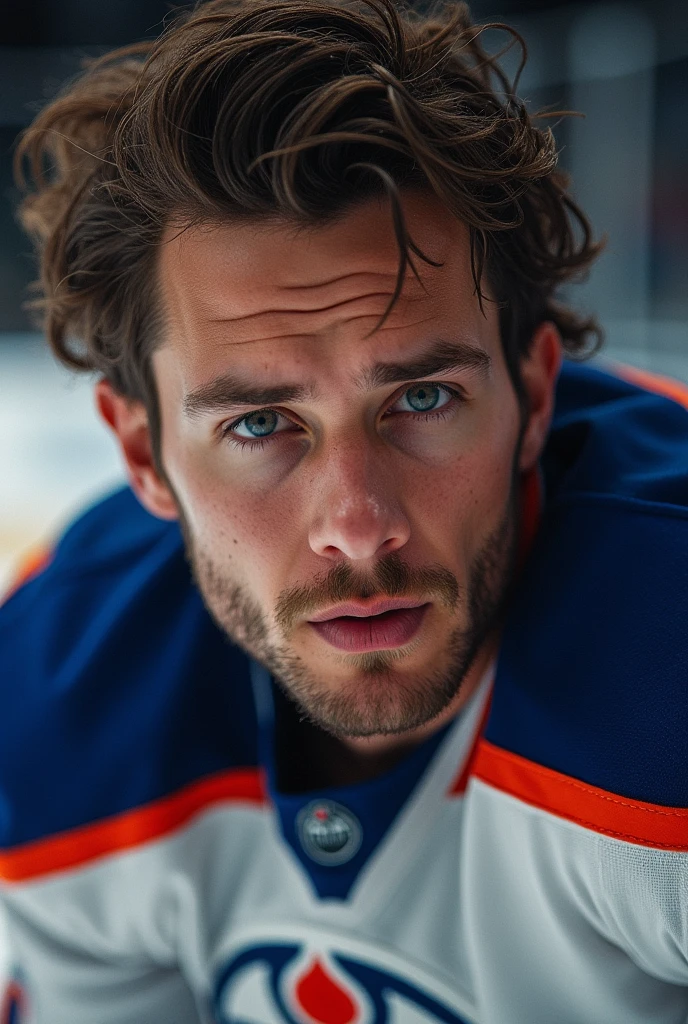 A Professional hockey player for the Edmonton OilersAppearance: A young Caucasian man with a muscular athletic build, messy dark brown hair, and an intense facial expression.Clothing: Edmonton Oilers hockey jersey and hockey gear, zoom face, close up face, middle face