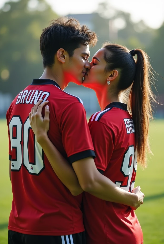 A couple kissing with their team jerseys on, with the name on the girl&#39;s shirt isa, and the name on the boy Bruno&#39;s shirt, with the numbers on the shirt 80 and 99, as if it were a photo 