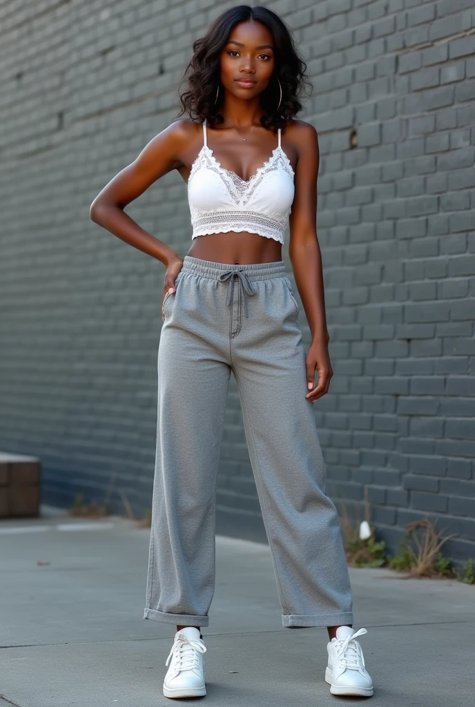 Girl: Age: 23 Height: 175 cm Nationality: African American 1. Face: Face shape: Oval face with smooth, dark skin of a warm chocolate hue. Eyes: Large brown eyes with long lashes. The gaze is soft and calm. Lips: Full, expressive lips of a natural dark pink color, with a slight smile. Nose: Straight nose with rounded nostrils, of neat shape. Hair: Medium length, white in color. 2. Figure: Body type: Average height with a feminine figure and smooth curves. The waist is well-defined, hips are rounded, creating an hourglass silhouette. Breasts: Size 3, natural shape. Shoulders: Slightly sloped, giving the figure a softer appearance. Legs: Slim, long legs with toned muscles. 3. Clothing: Top: White lace sports top. Bottom: Wide gray sweatpants that accentuate the figure's curves. Shoes: High white sneakers. 4. Pose: A dynamic pose. 5. Location: Background: A gray brick wall on a street. Lighting: Studio lighting. Details: Some bricks are broken. Mood: Cozy and calm atmosphere, the girl appears relaxed and enjoying solitude. don't blur the background