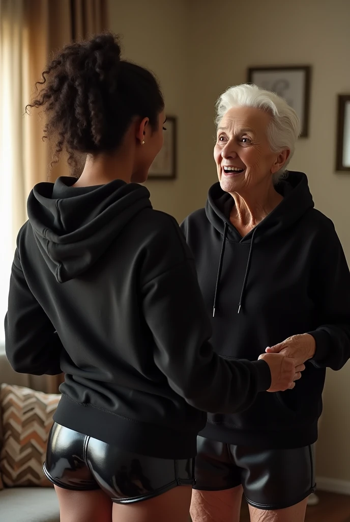 black woman hair in a bun black hoodie black leather short shorts getting fucked in the ass by a old age white grandma in a dress in a living room
