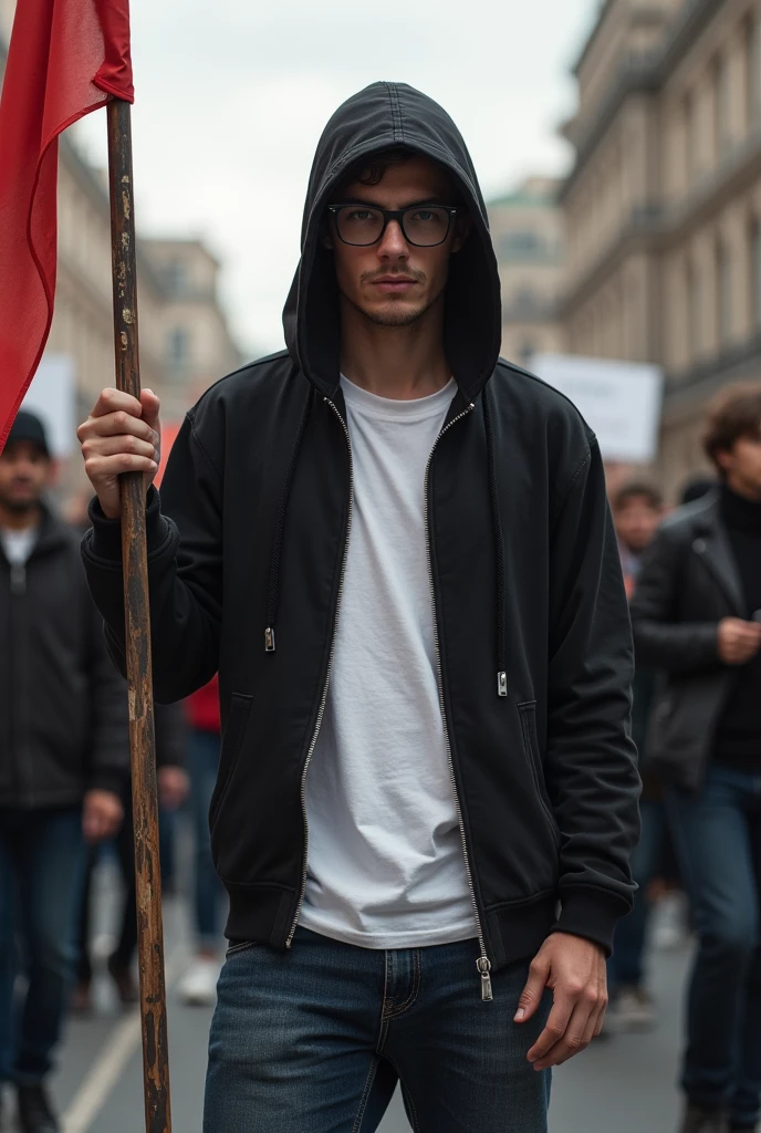 A young man with the hood of his black hoodie with a zip and a white TShirt holding a banner in a revolution. Wearing a black Glasses. A blue jeans. He is holding the banner in a strike. He looks like a hacker. Stand full short