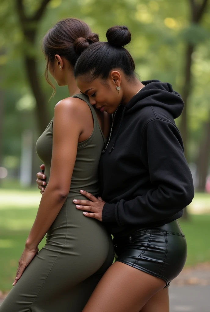 black woman hair in a bun black hoodie black leather short shorts bending over getting fucked in the ass by a old ugly woman in a dress in a park