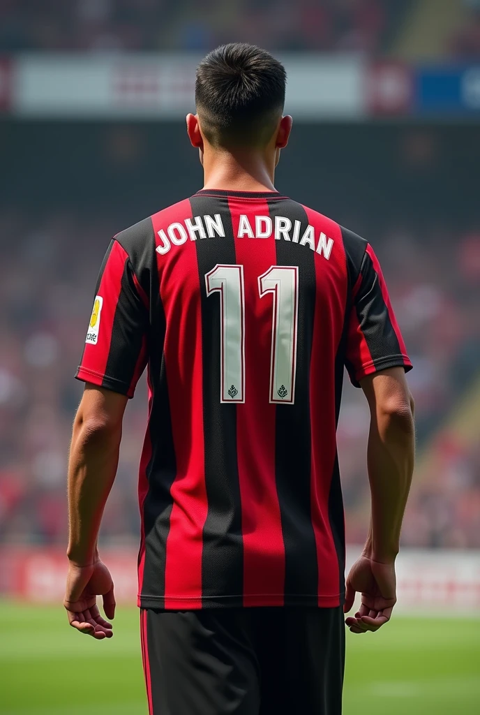 player, showing red and black striped soccer shirt Number:11 Name: John Adrian