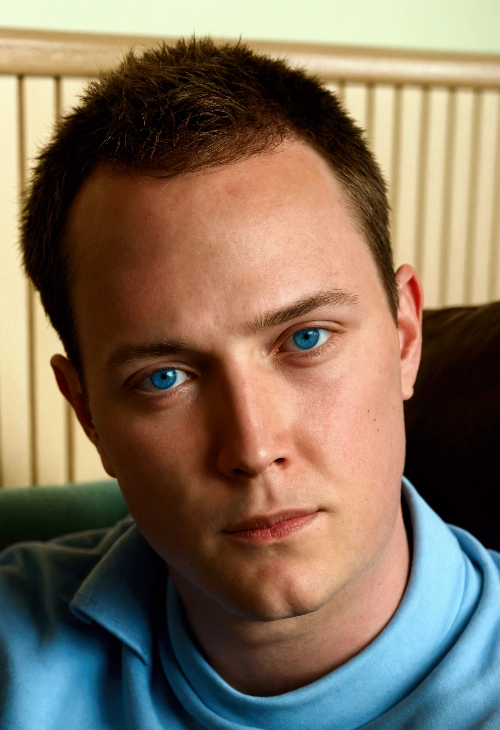 there is a man sitting on a couch with a cell phone, brandon, marcus whinney, taken in the late 2000s, clean shaven!!!!, profile pic, blue eyes and large forehead, taken in the mid 2000s, profile photo, around 1 , marshal mathers, profile image, leaked photo